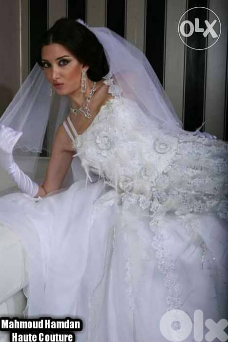 فستان عرس تطريز يدوي راقي مع ريش 0
