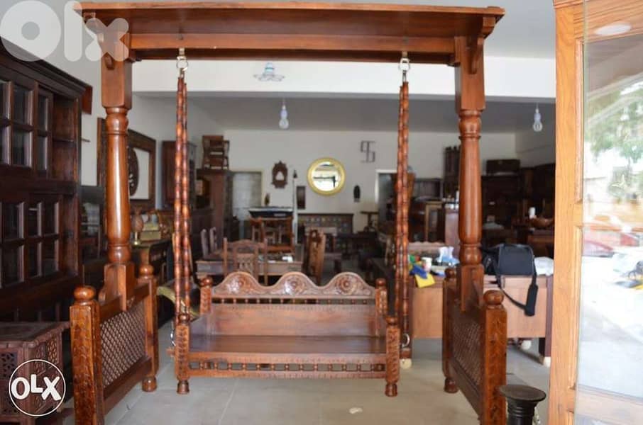 a solid wood swing 0