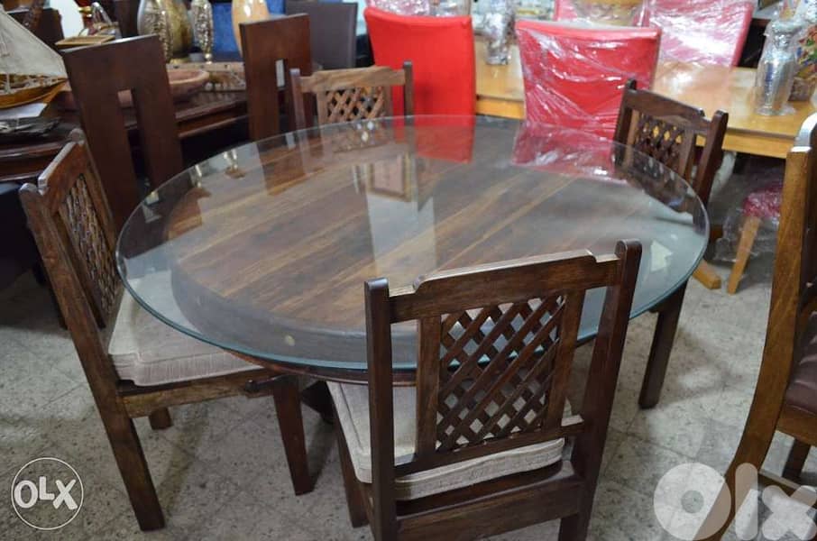 round solid wood teak table with 4 chairs 1