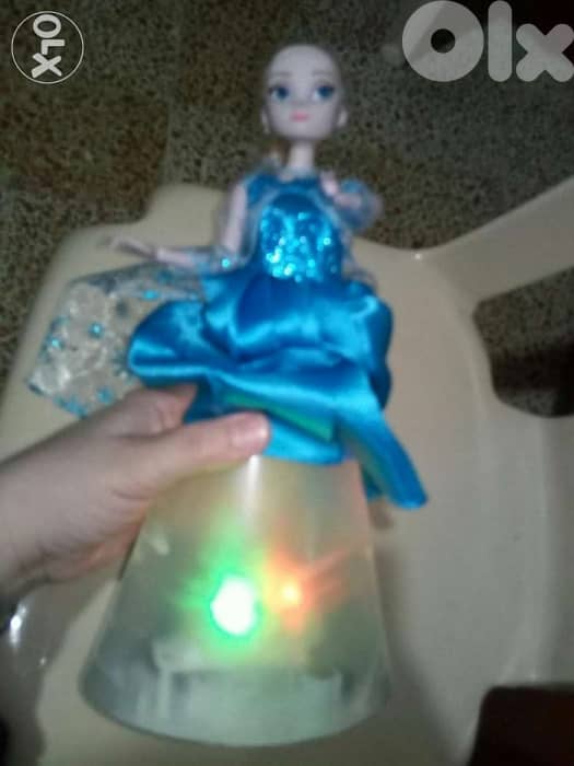 Offer: QUEEN ELSA SPARKLE LIGHT SKIRT Melody machine plastic skirt=18$ 1