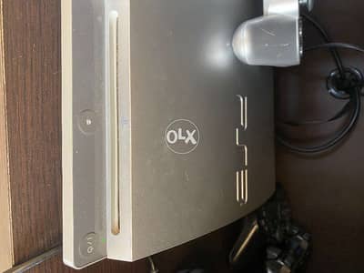 MOVING SALE - PS3 great condition with two controllers + 5 Free Games