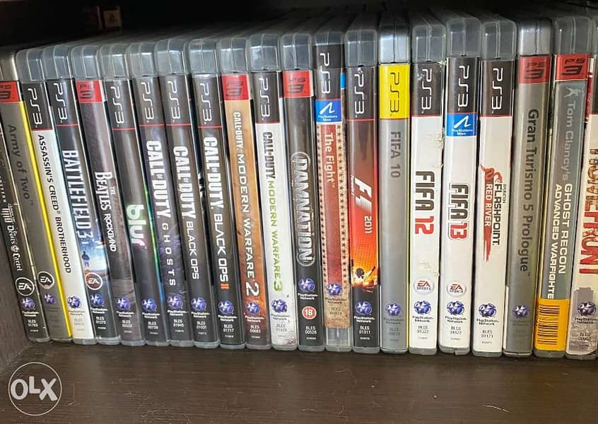 MOVING SALE - PS3 great condition with two controllers + 5 Free Games 1