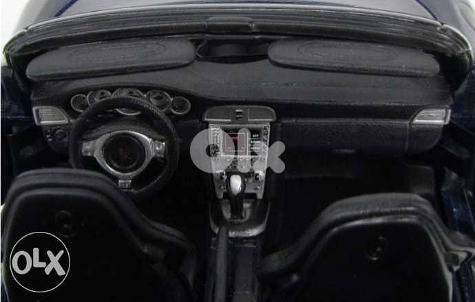 Porsche Carrera S Cabriolet diecast car model 1:18. 6