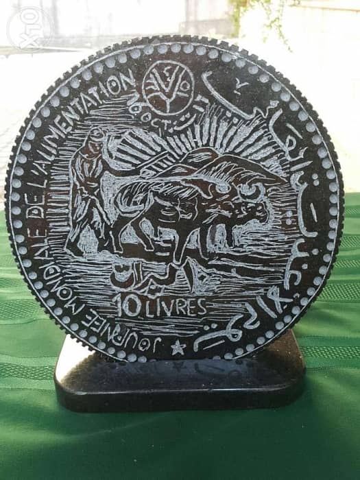 10 ليرات منحوتة رخامية 0