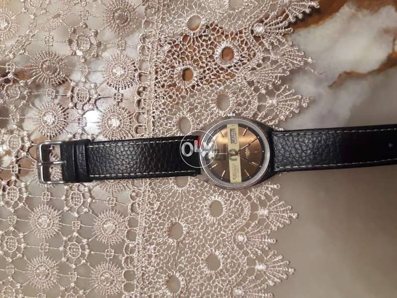 ساعة سيتزن 1