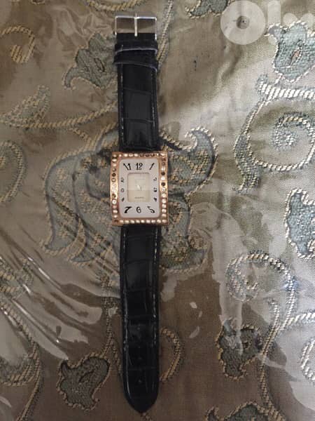 Quartz - ساعة يد 0