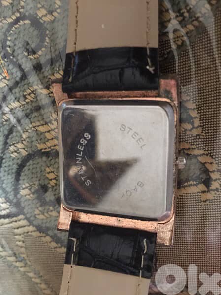 Quartz - ساعة يد 1