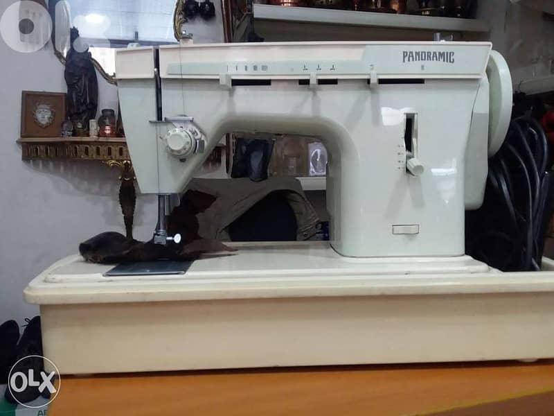 مكنة خياطة ايطالية 0