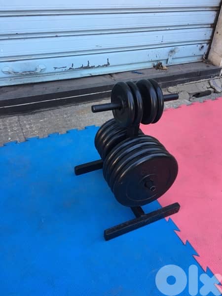 rack with rubber plates like new we have also all sports equipment 2