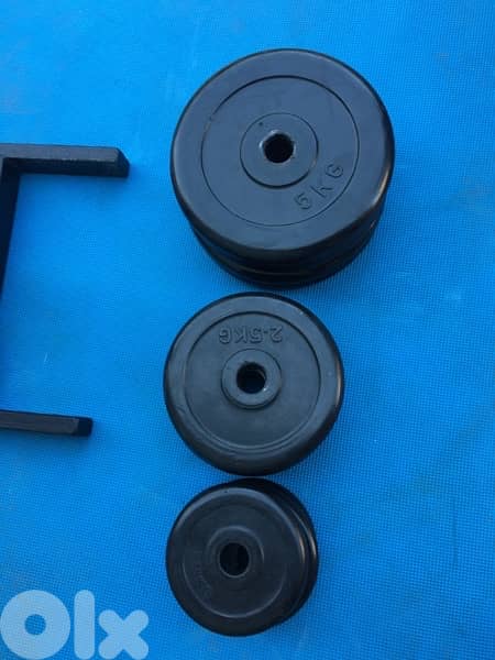 rack with rubber plates like new we have also all sports equipment 5