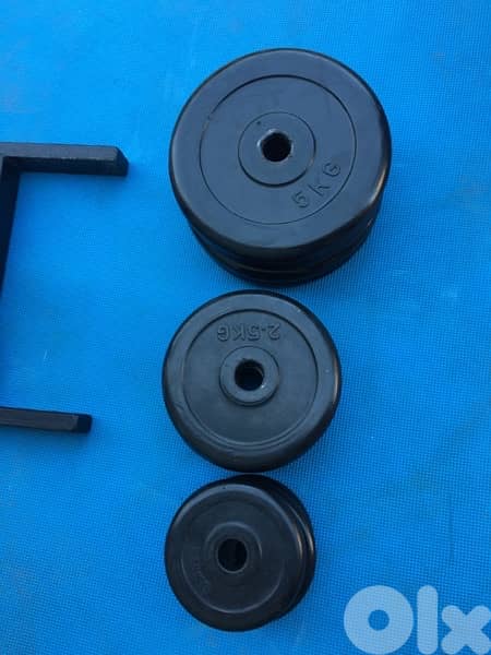 rubber dumbells 40 kilo like new we have also all sports equipment 3