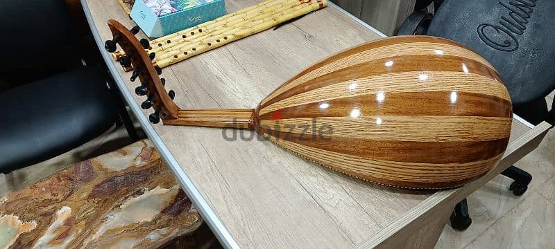 عود احتراف صناعه معملنا دوزان دو دو صوت مميز مع شنطه مبطنه 1