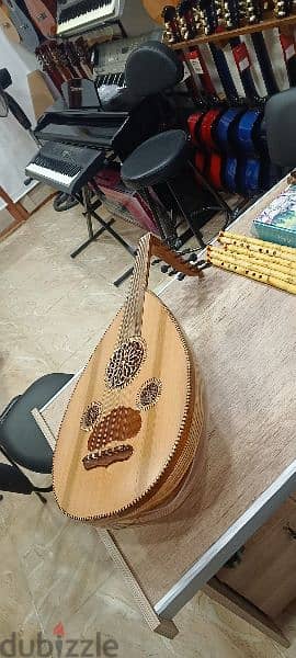 عود احتراف صناعه معملنا دوزان دو دو صوت مميز مع شنطه مبطنه 4