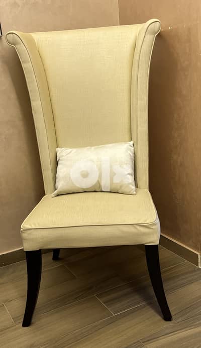 Two high back chairs.