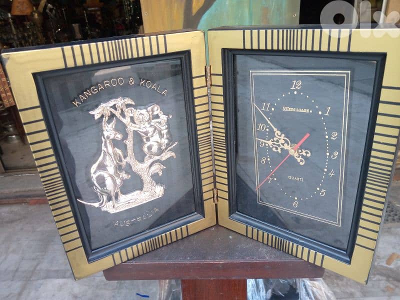 ساعة مع تابلو 0