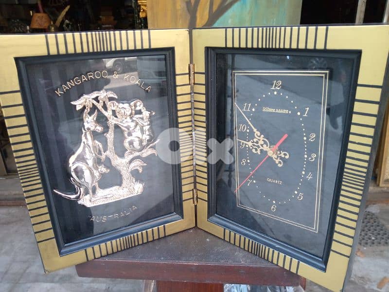 ساعة مع تابلو 1