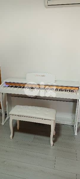 one week offer piano white glossy new in box with chair free 0