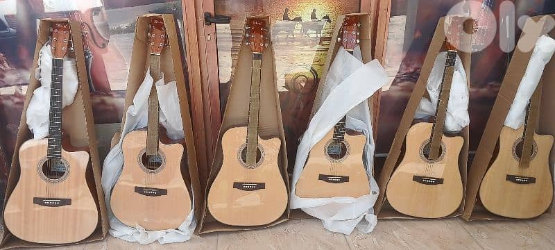 acoustic guitar new in box 4/4 0