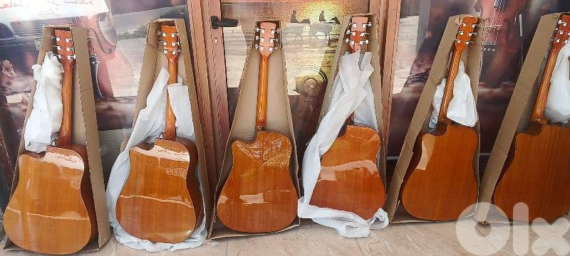 acoustic guitar new in box 4/4 1