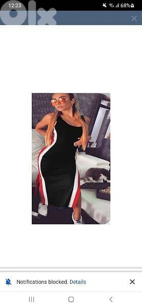 dress aswad . ahmar w abyad 3ala janeb s to xxL 6