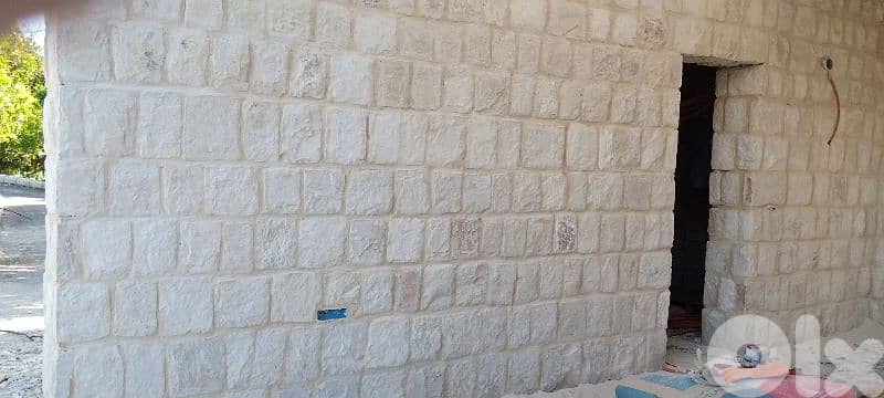 بناءمنازل حجرصخري 7