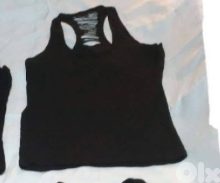 top. tank top shreded back s to xxL  1=7$ or 3=15$ 1
