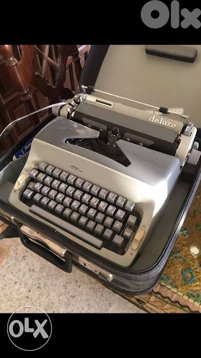 دكتيلوdactyloحديد مع لcatalogخارقة النظافة تعمل بشكل ممتاز موديل١٩٦٠