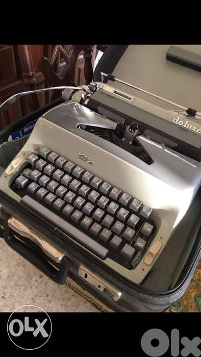 دكتيلوdactyloحديد مع لcatalogخارقة النظافة تعمل بشكل ممتاز موديل١٩٦٠ 1