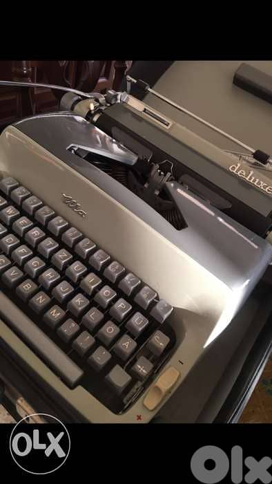 دكتيلوdactyloحديد مع لcatalogخارقة النظافة تعمل بشكل ممتاز موديل١٩٦٠ 2