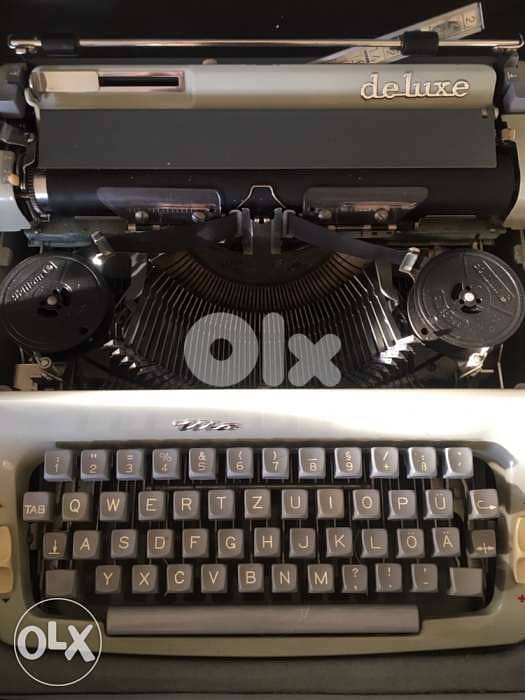 دكتيلوdactyloحديد مع لcatalogخارقة النظافة تعمل بشكل ممتاز موديل١٩٦٠ 4