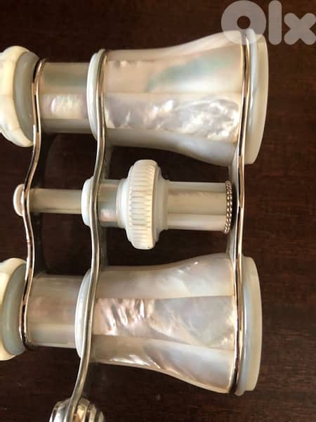 Mother of pearl opera glasses . 4