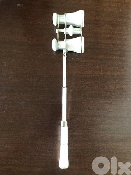 Mother of pearl opera glasses . 7