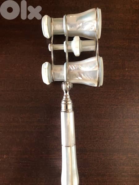 Mother of pearl opera glasses . 8