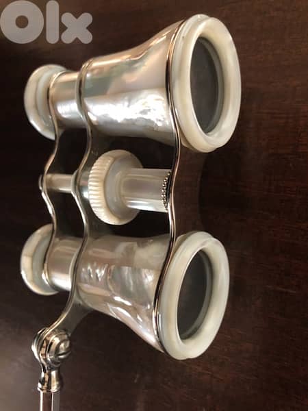 Mother of pearl opera glasses . 9