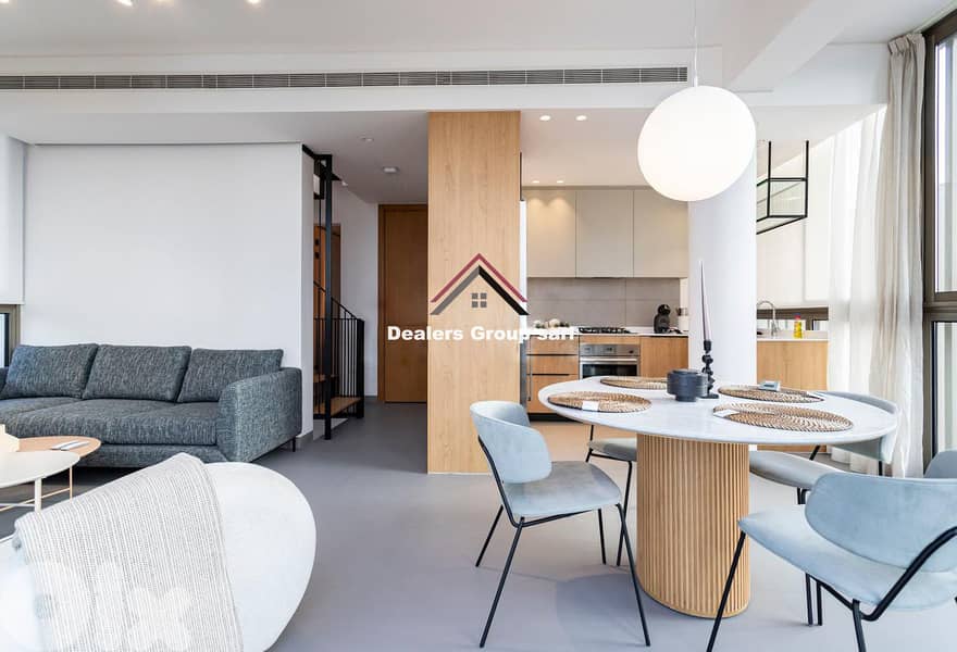 Stunning. Unique. And Very Upscale Triplex with Private Terrace 0