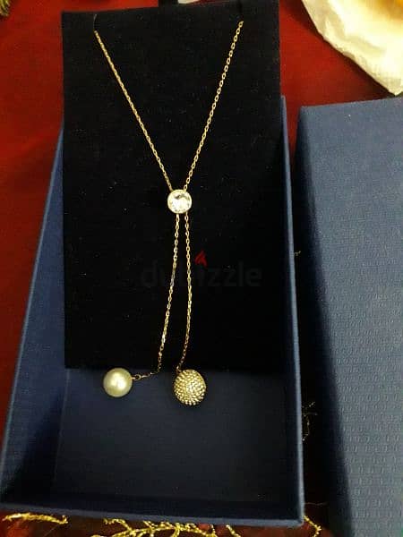 Swarovski forward y necklace authentic 1