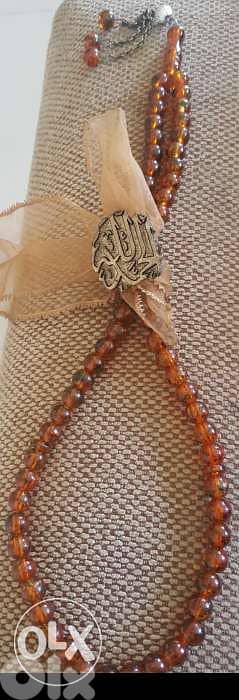 مسبحة كهرمان حشري. صناعي. للجادين