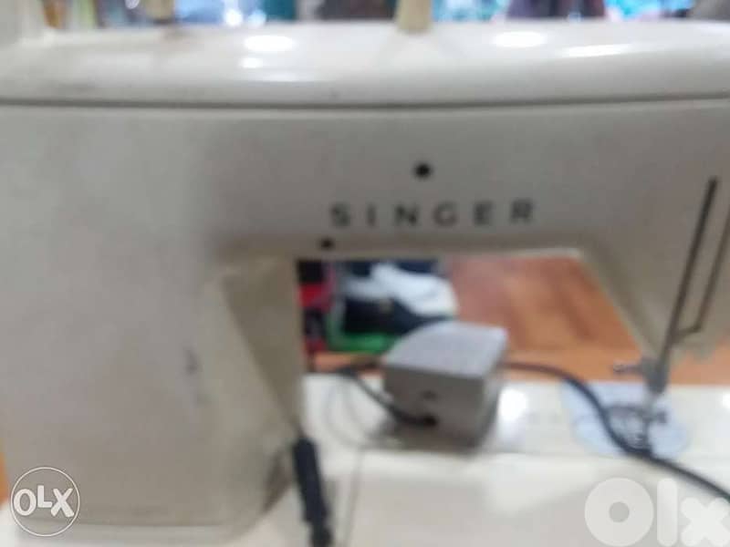 مكنة خياطة سنجر 1