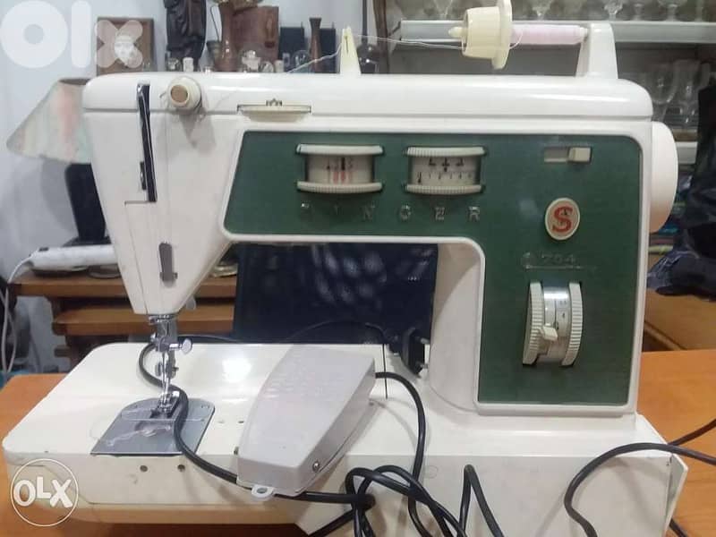 مكنة خياطة سنجر 2