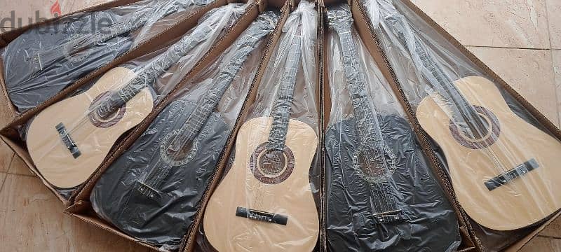 العرض الاقوى غيتار كلاسيك + شنطه + ريشه 0