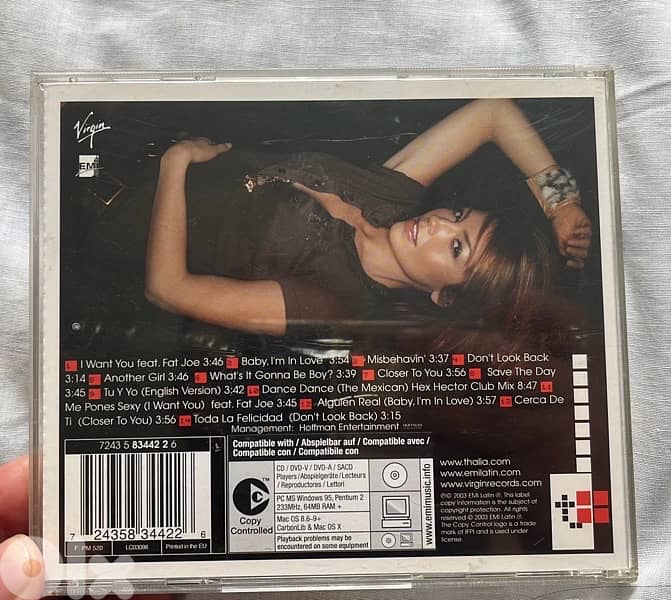 thalia the mexican singer each for 6usd cd /Both  for 10 $ 2