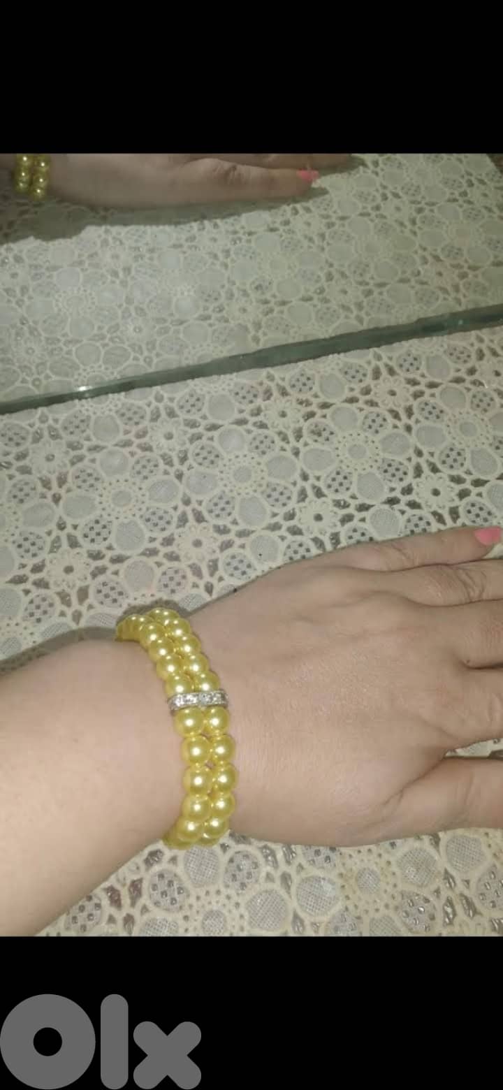 necklace long yellow colour with flower brooch and bracelet 1