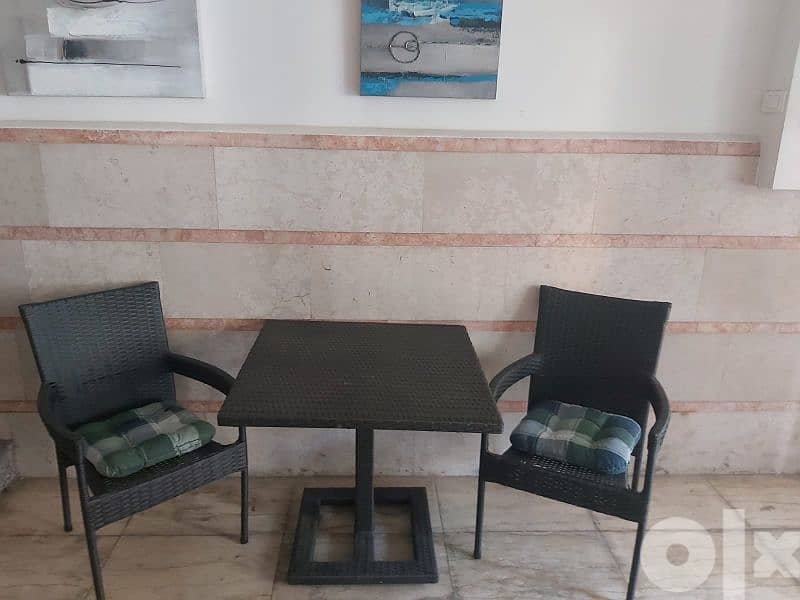table and two chairs 0