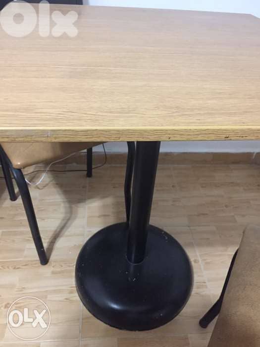 Table and 2 chairs. wood and metal. طاولة وكراسي 1