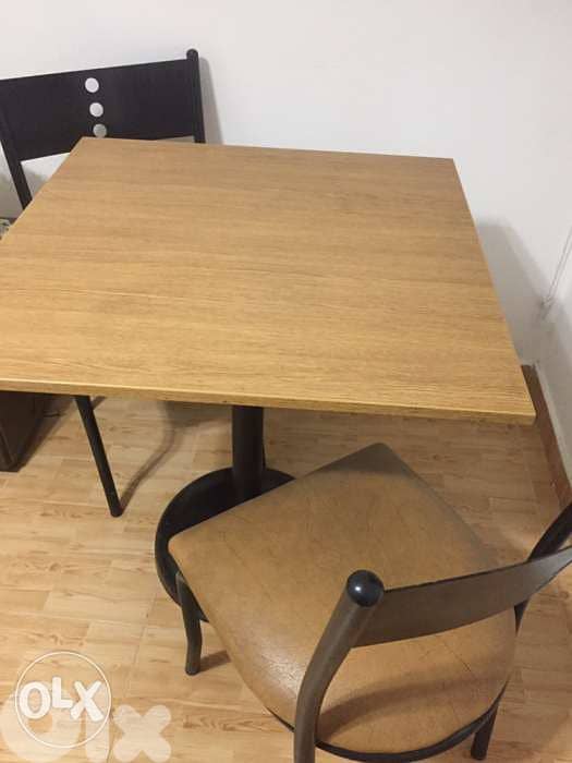 Table and 2 chairs. wood and metal. طاولة وكراسي 4