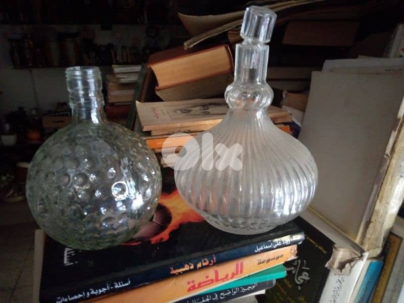 تشكيلة واسعة من القناني زجاج مشكل 0