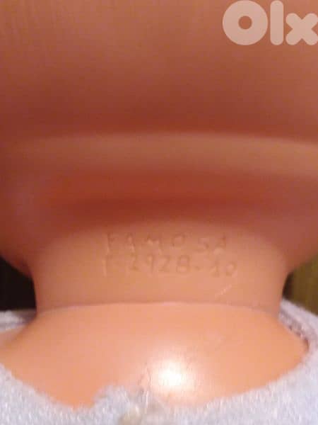 FAMOSA BABY GIRL original barely used Big & wearing toy still good=21$ 3