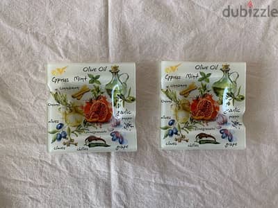 a pair of 2 Ashtrays