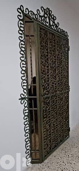 باب حديد شغل يد ملوكي ( Fer Forgé) 1