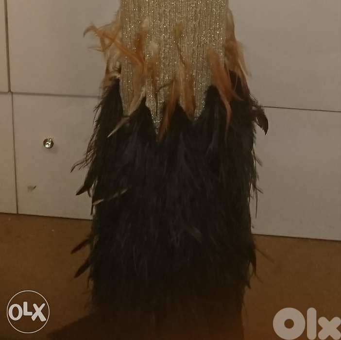سينييه مع ريش قطعة واحدة ما في غيرها Haute Couture 100$ 0